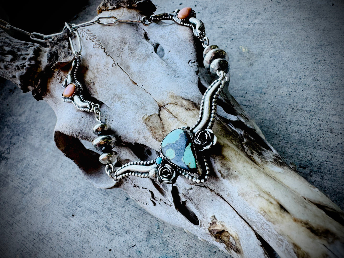 Hubei Turquoise and Pink Conch Silversmith Steer Necklace
