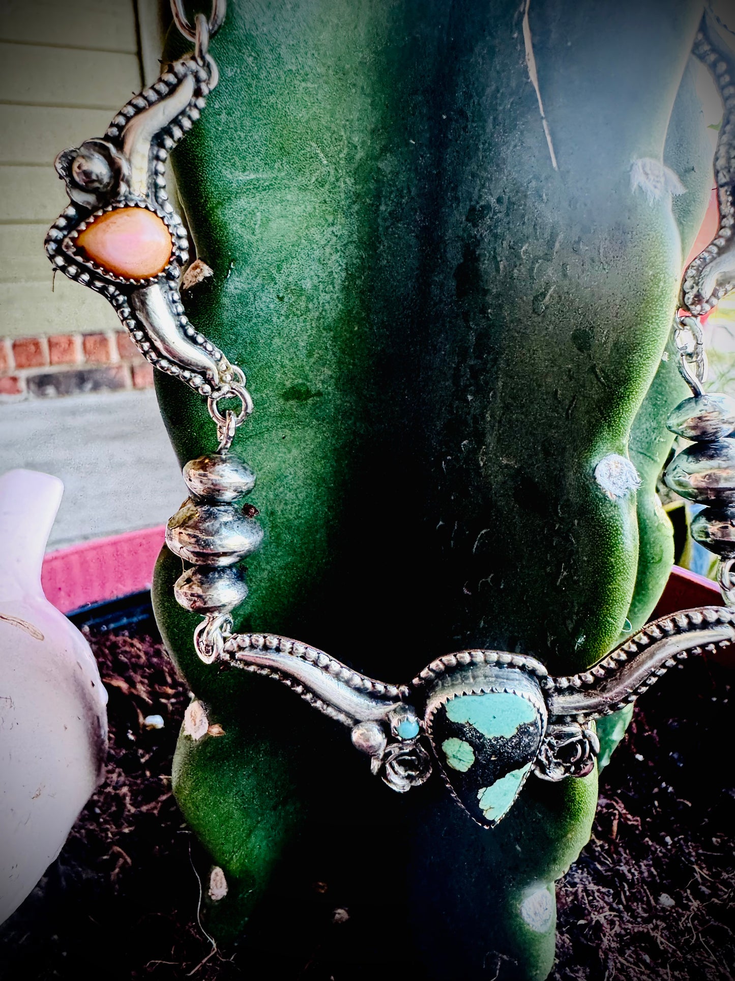 Hubei Turquoise and Pink Conch Silversmith Steer Necklace