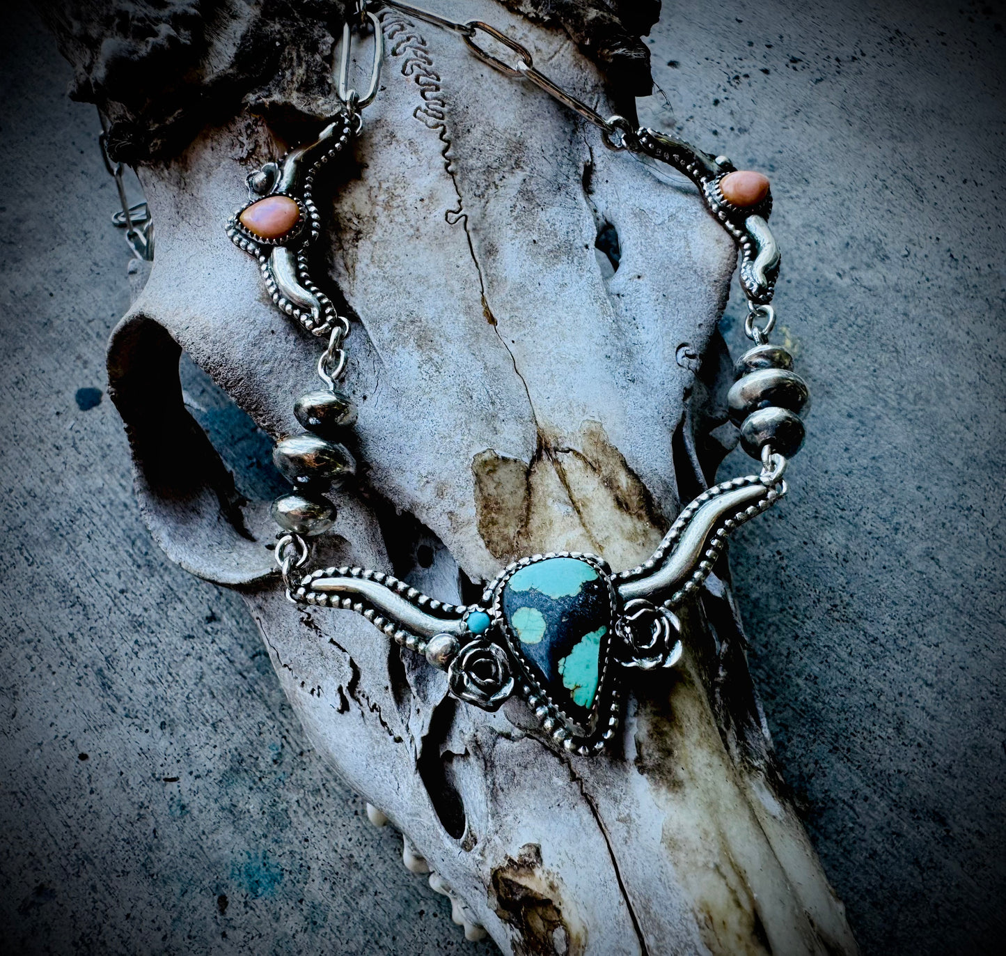Hubei Turquoise and Pink Conch Silversmith Steer Necklace