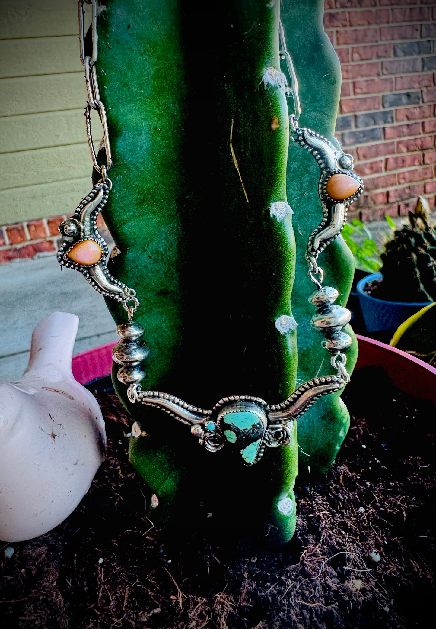Hubei Turquoise and Pink Conch Silversmith Steer Necklace